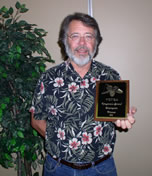 Billy accepts tree champion plaque
